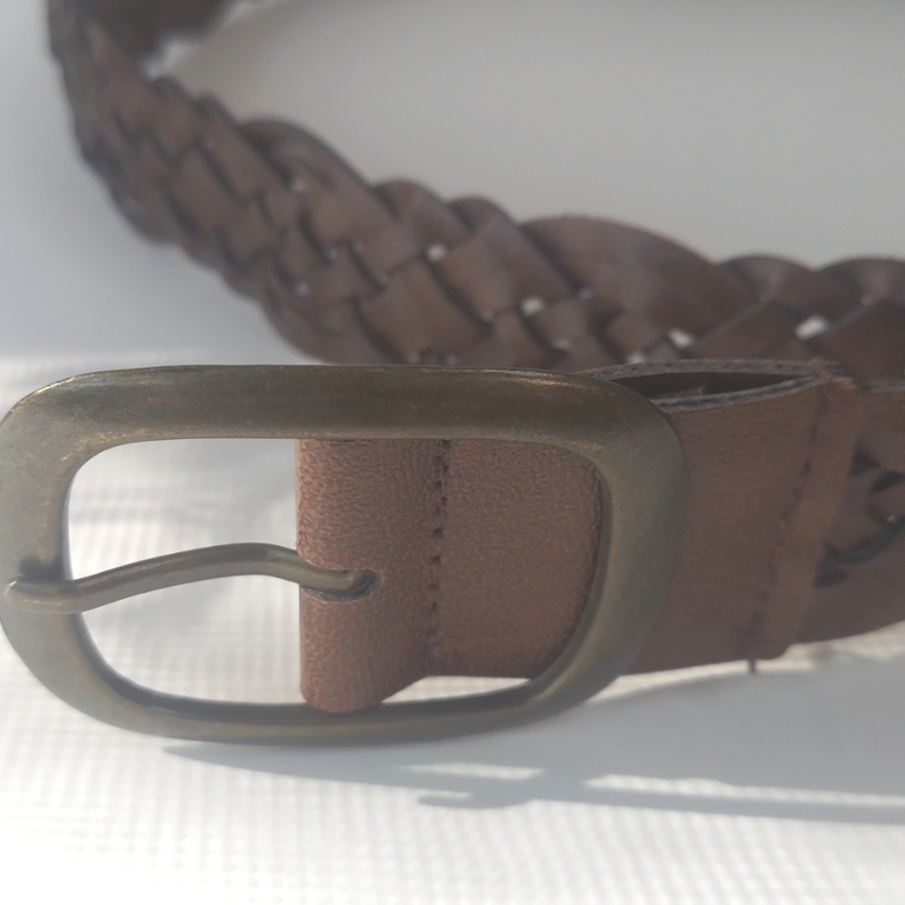 Faux leather braided belt-total length 48" with brass buckle.